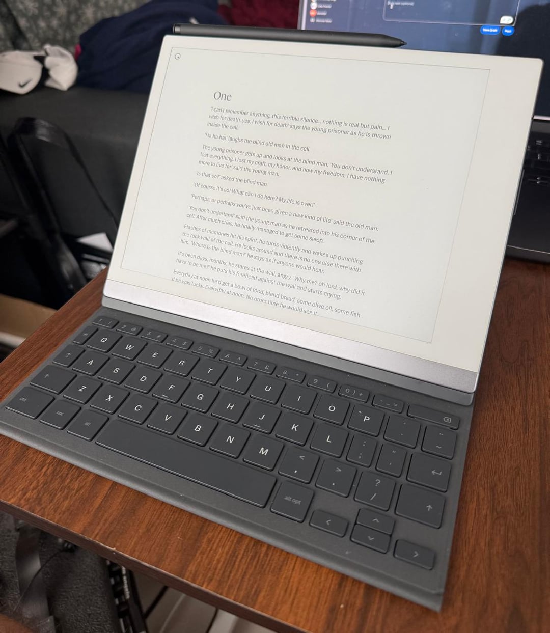 reMarkable 2 tablet with Type Folio keyboard cover, open on a table like a modern typewriter